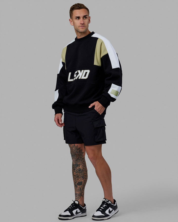 Man wearing Unisex Slam Sweater Oversize - Black-Gold