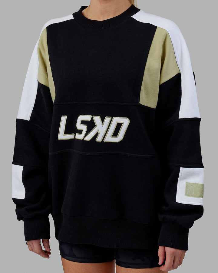 Woman wearing Unisex Slam Sweater Oversize - Black-Gold