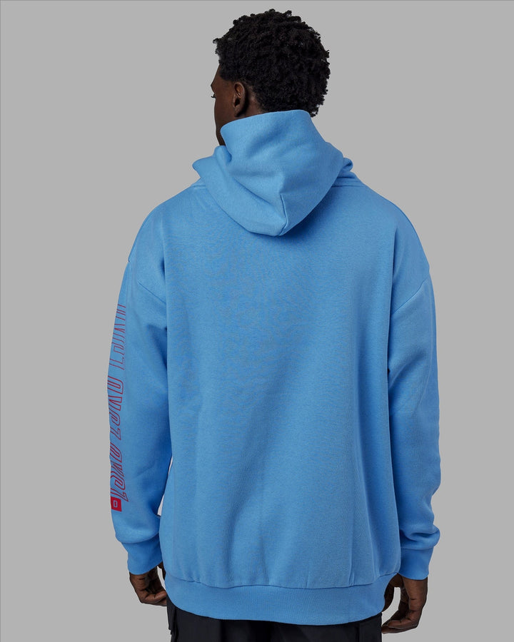 Man wearing Unisex Stretch It Hoodie Oversize - Azure Blue