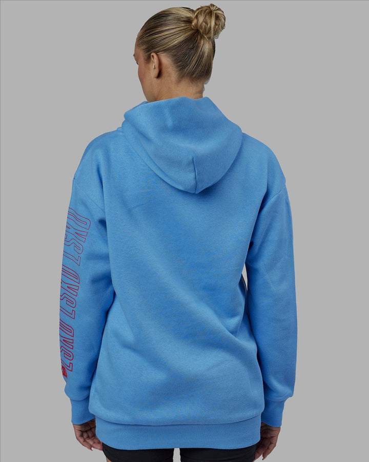 Woman wearing Unisex Stretch It Hoodie Oversize - Azure Blue