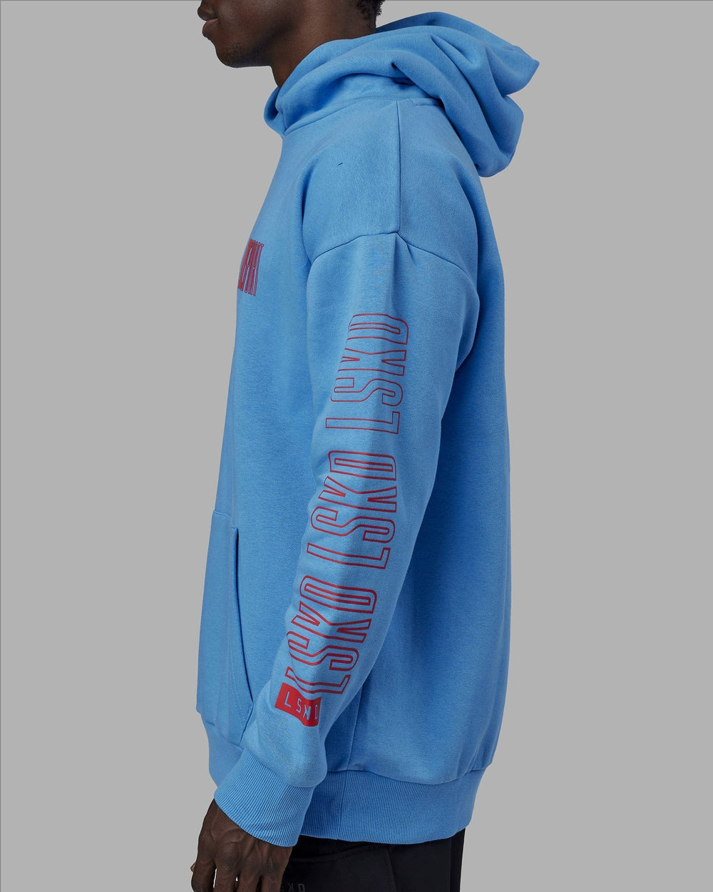 Man wearing Unisex Stretch It Hoodie Oversize - Azure Blue