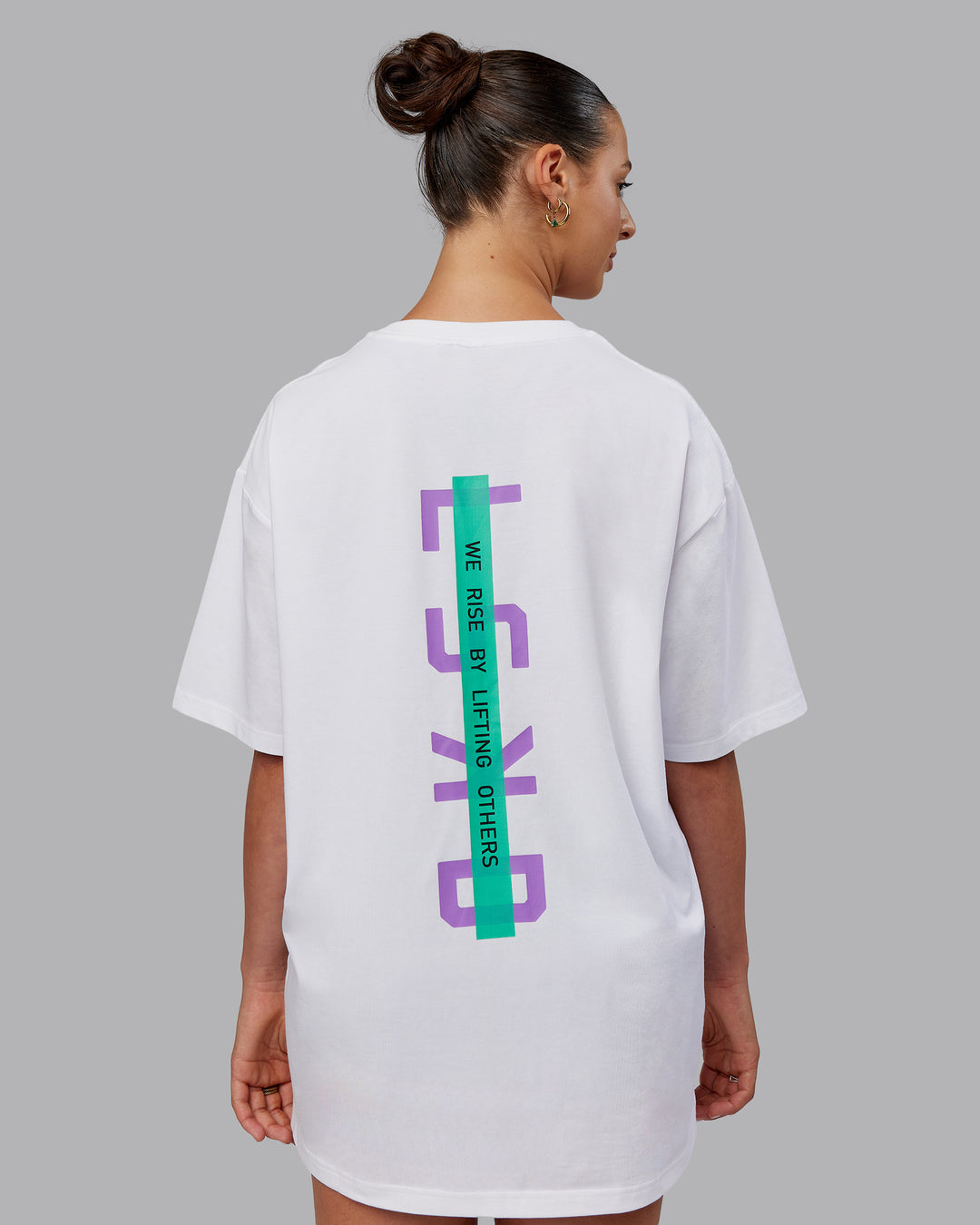 Woman wearing Unisex Strike Through FLXCotton Tee Oversize - White-Purple Swirl