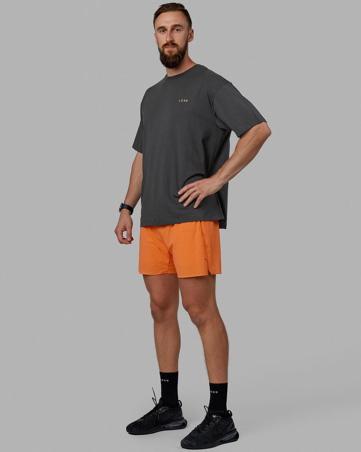 Man wearing Unisex VS2 FLXCotton Tee Oversize - Phantom-Tangerine