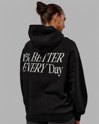 Woman wearing Unisex VS6 Hoodie Oversize - Black-White