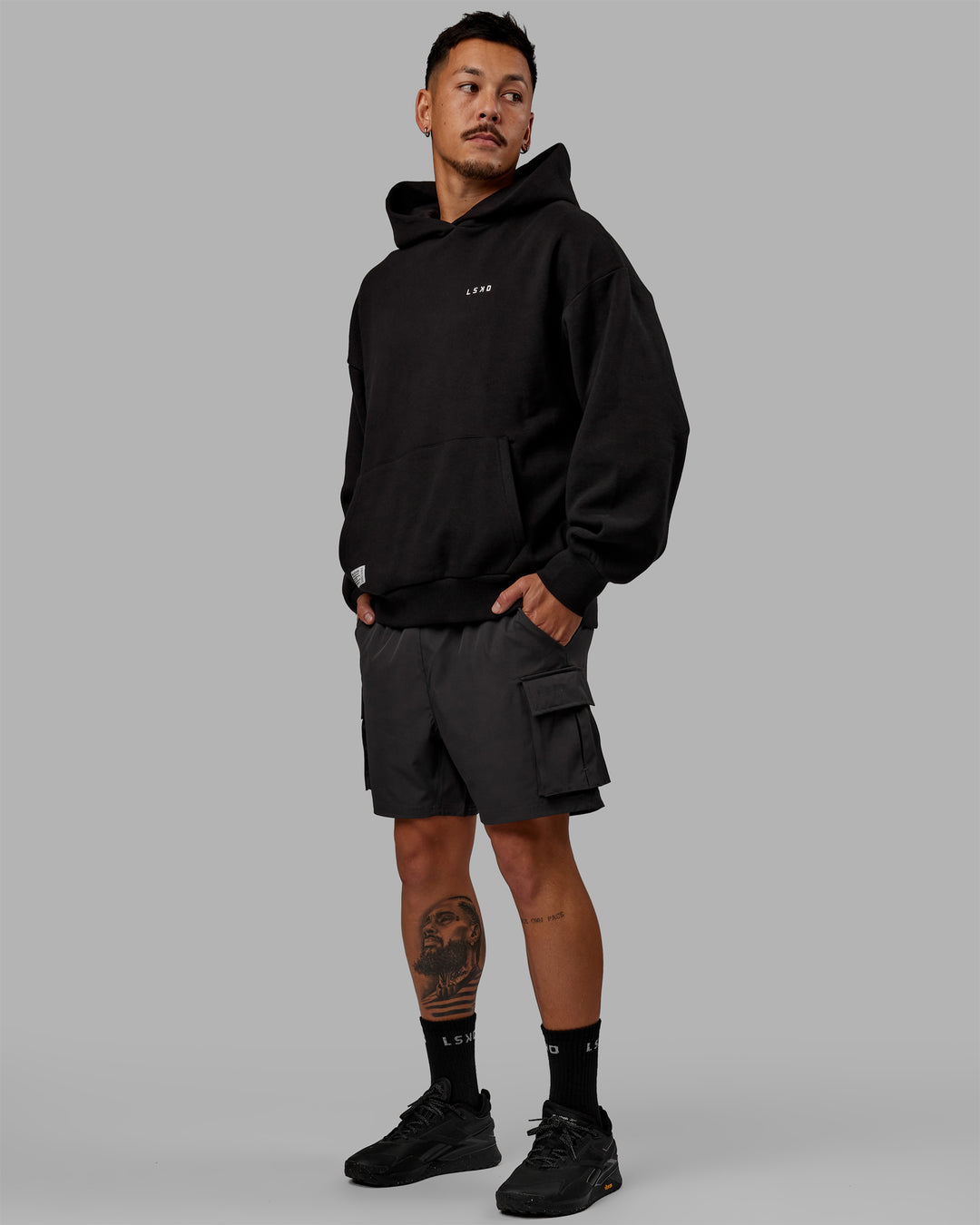 Man wearing Unisex VS6 Hoodie Oversize - Black-White