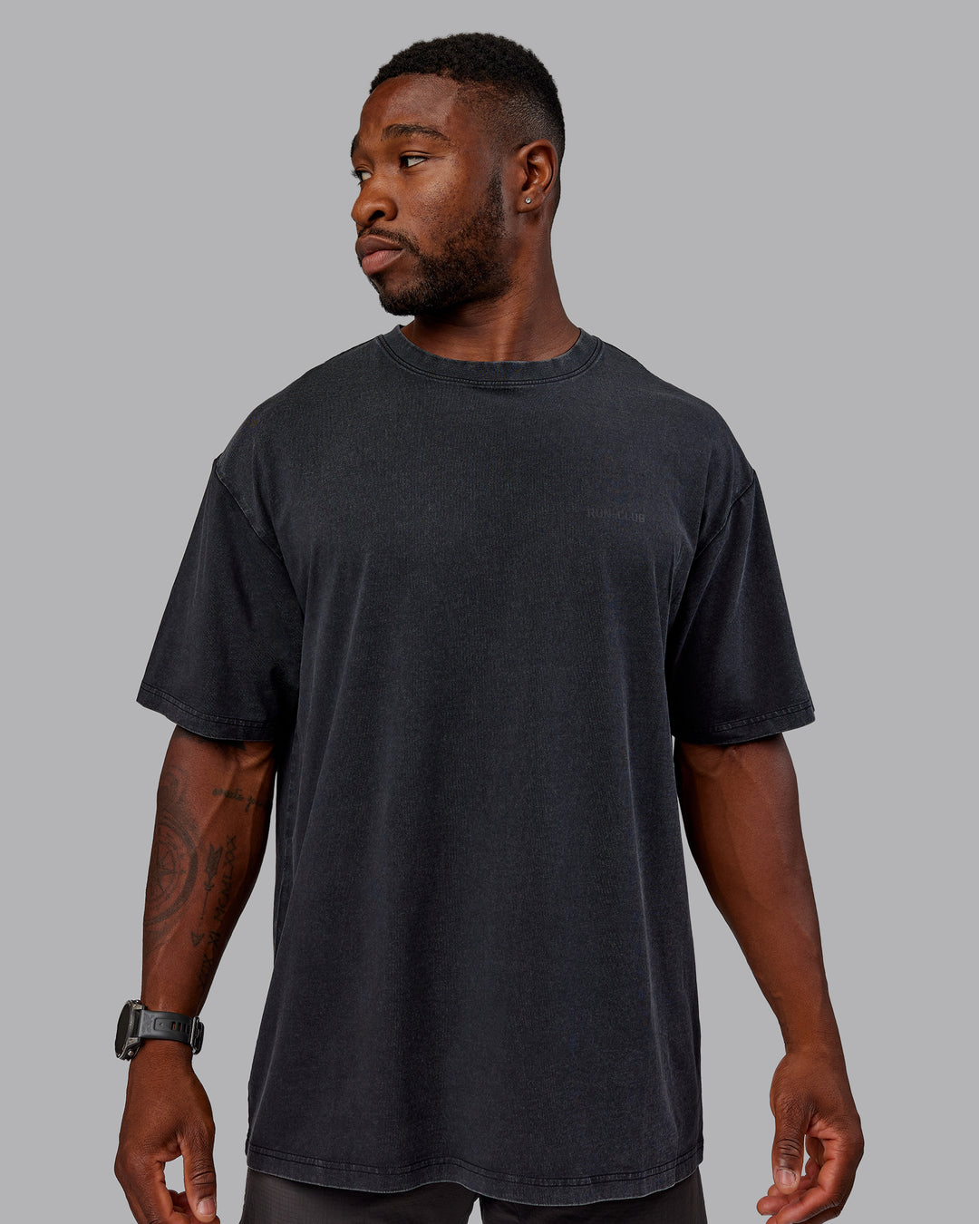 Man wearing Unisex Washed RUN CLUB FLXCotton Tee Oversize - Black-Black