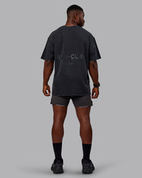 Man wearing Unisex Washed RUN CLUB FLXCotton Tee Oversize - Black-Black