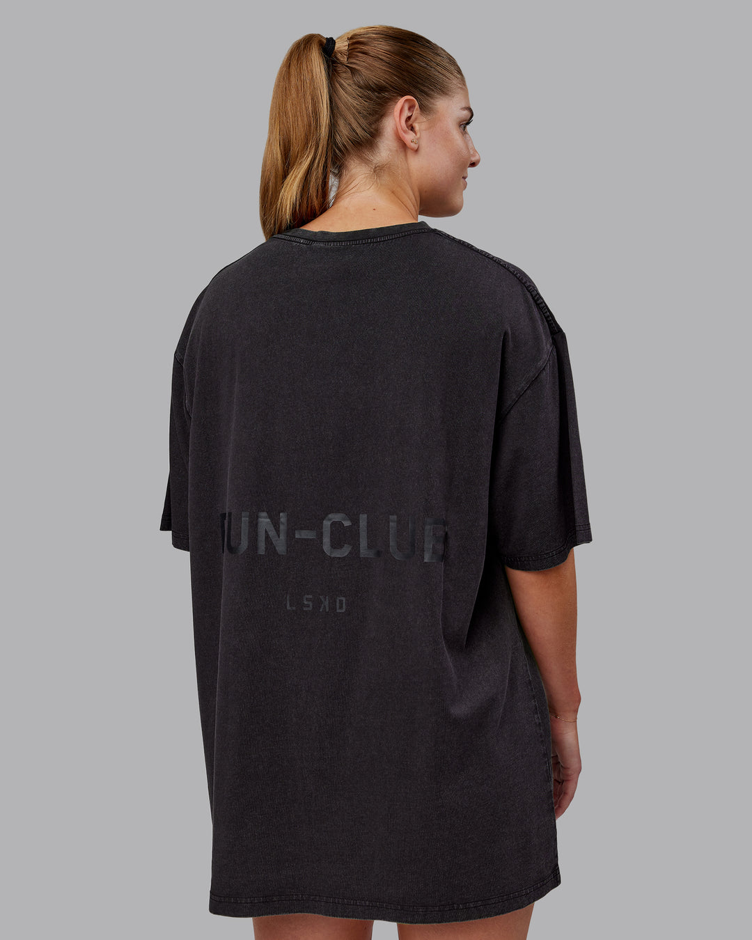 Man wearing Unisex Washed RUN CLUB FLXCotton Tee Oversize - Black-Black