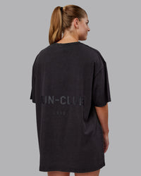Man wearing Unisex Washed RUN CLUB FLXCotton Tee Oversize - Black-Black