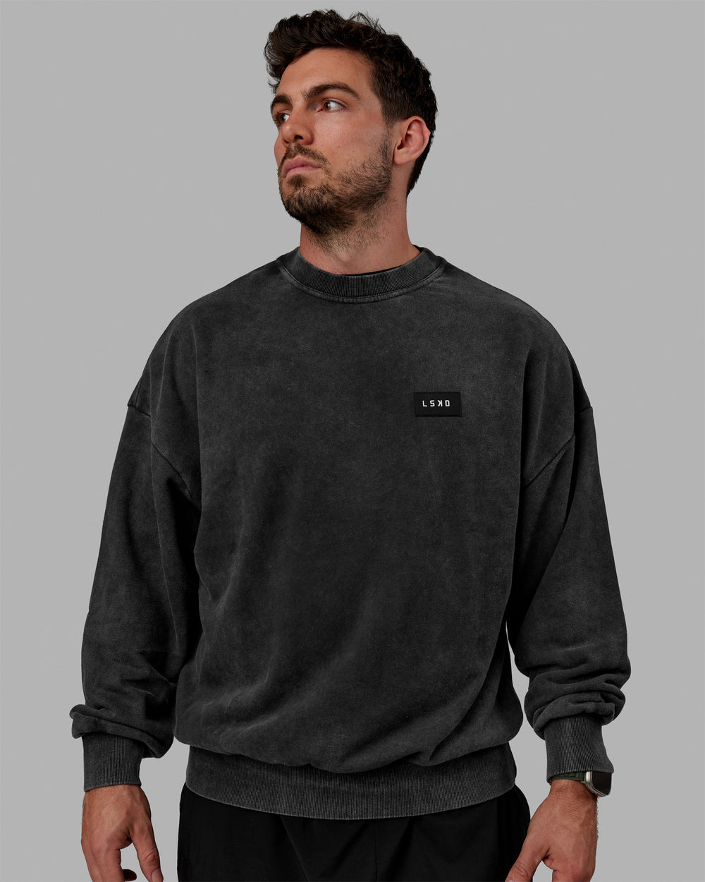 Man wearing Unisex Washed Segmented Oversized Sweater - Black