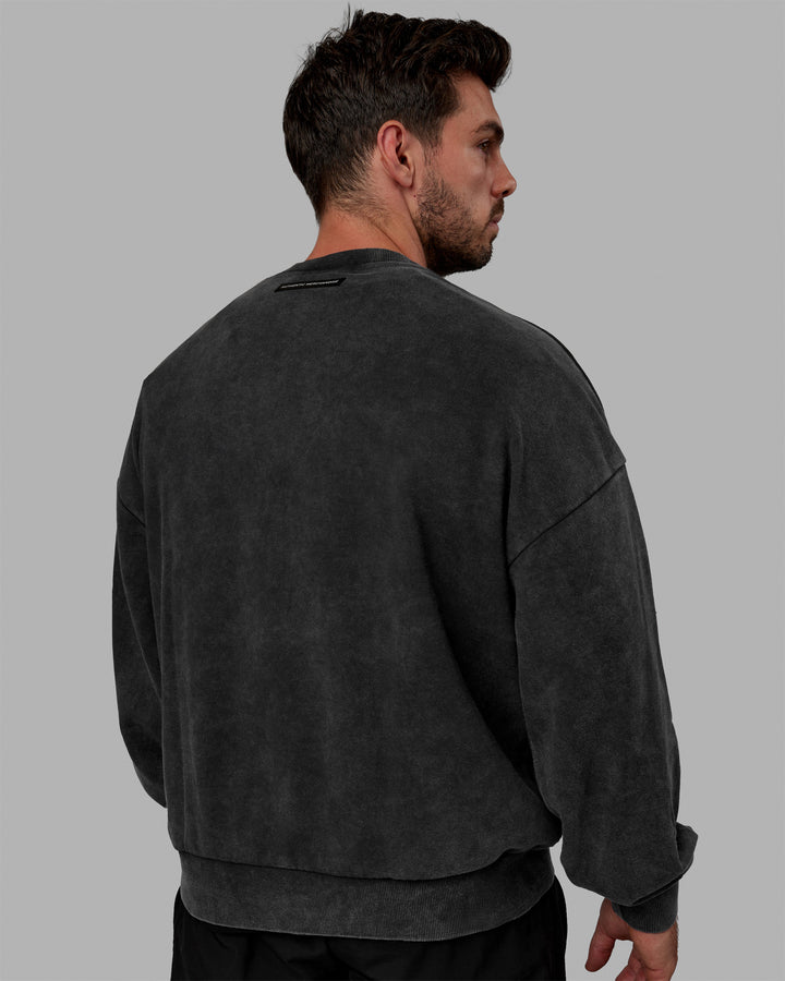 Man wearing Unisex Washed Segmented Oversized Sweater - Black