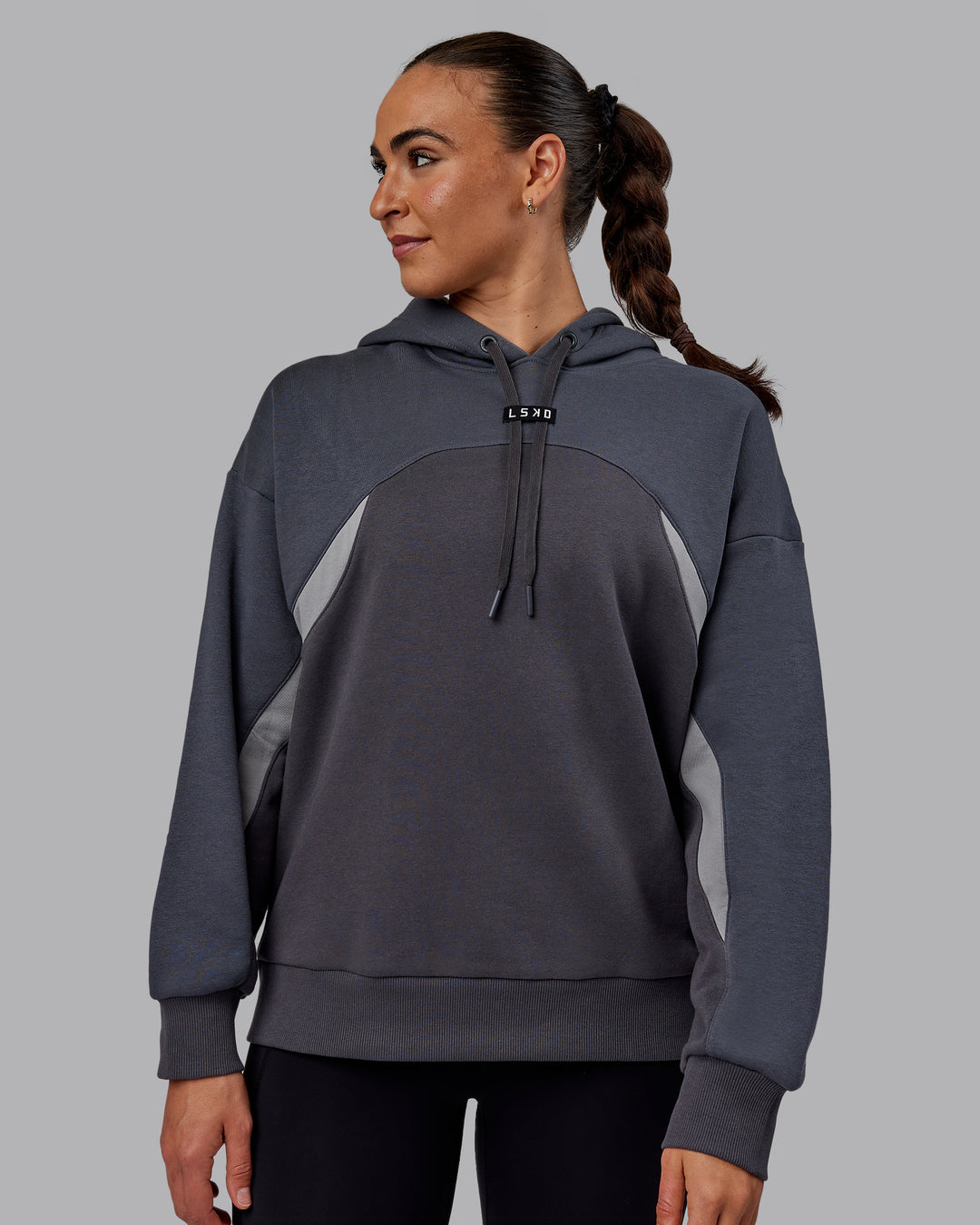 Woman wearing Unisex Y2K Concept Panel Hoodie - Asphalt-Turbulance - view 5