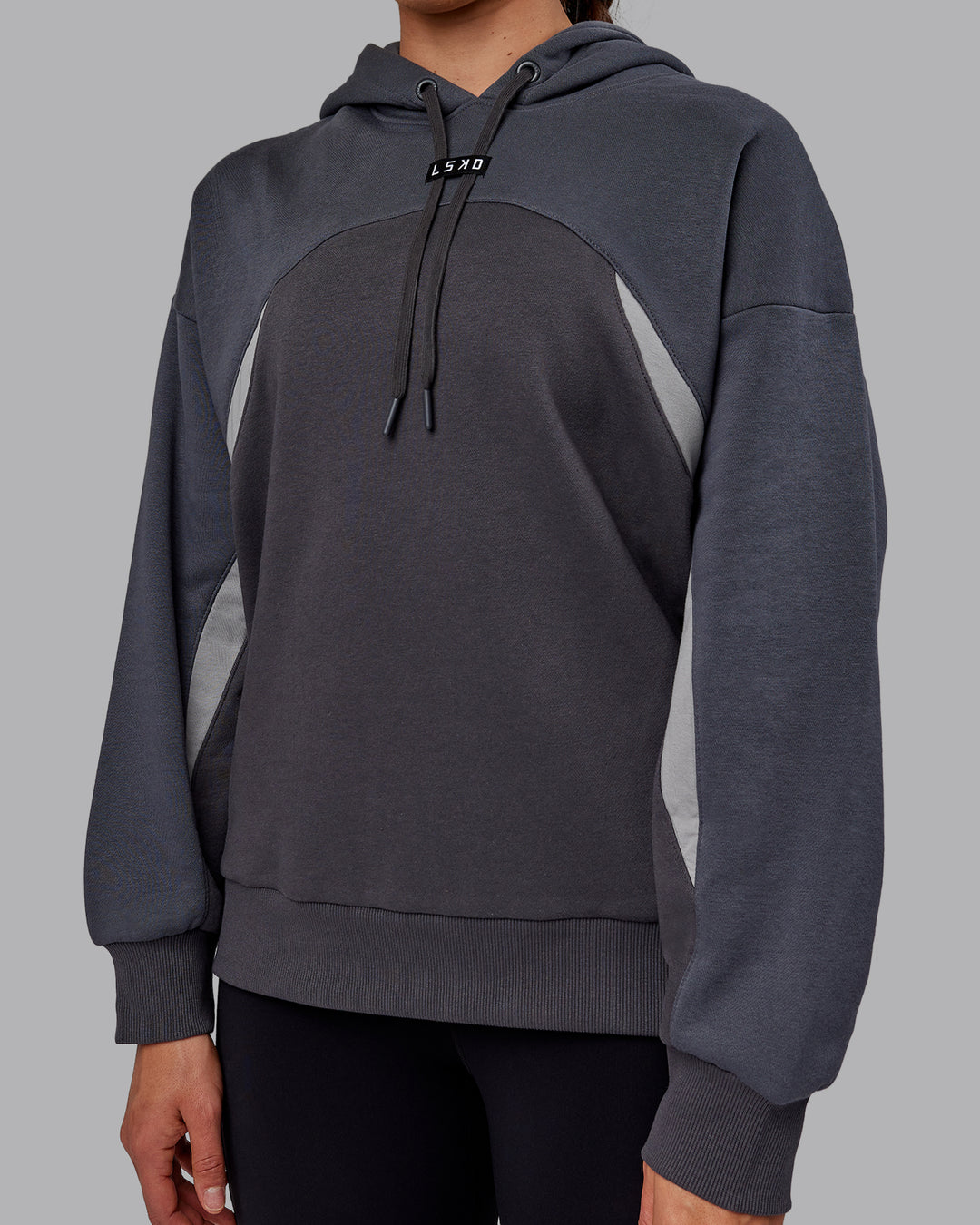 Woman wearing Unisex Y2K Concept Panel Hoodie - Asphalt-Turbulance - view 12