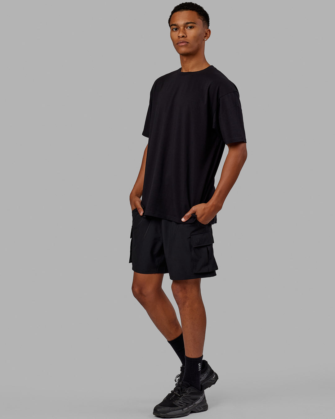 Man wearing Unisex You Got This FLXCotton Oversize Tee - Black-Pink