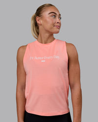 Woman wearing Unleash 1% Better Training Tank - Murex Shell-White