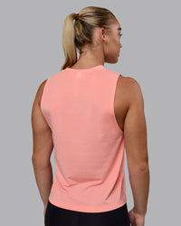 Woman wearing Unleash 1% Better Training Tank - Murex Shell-White
