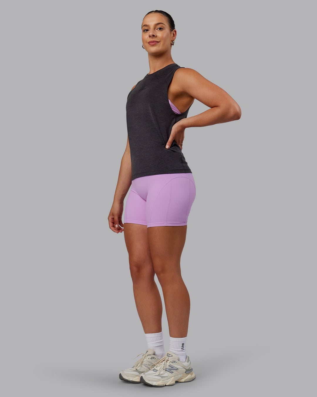 Woman wearing Unleash Training Tank - Charcoal Marl