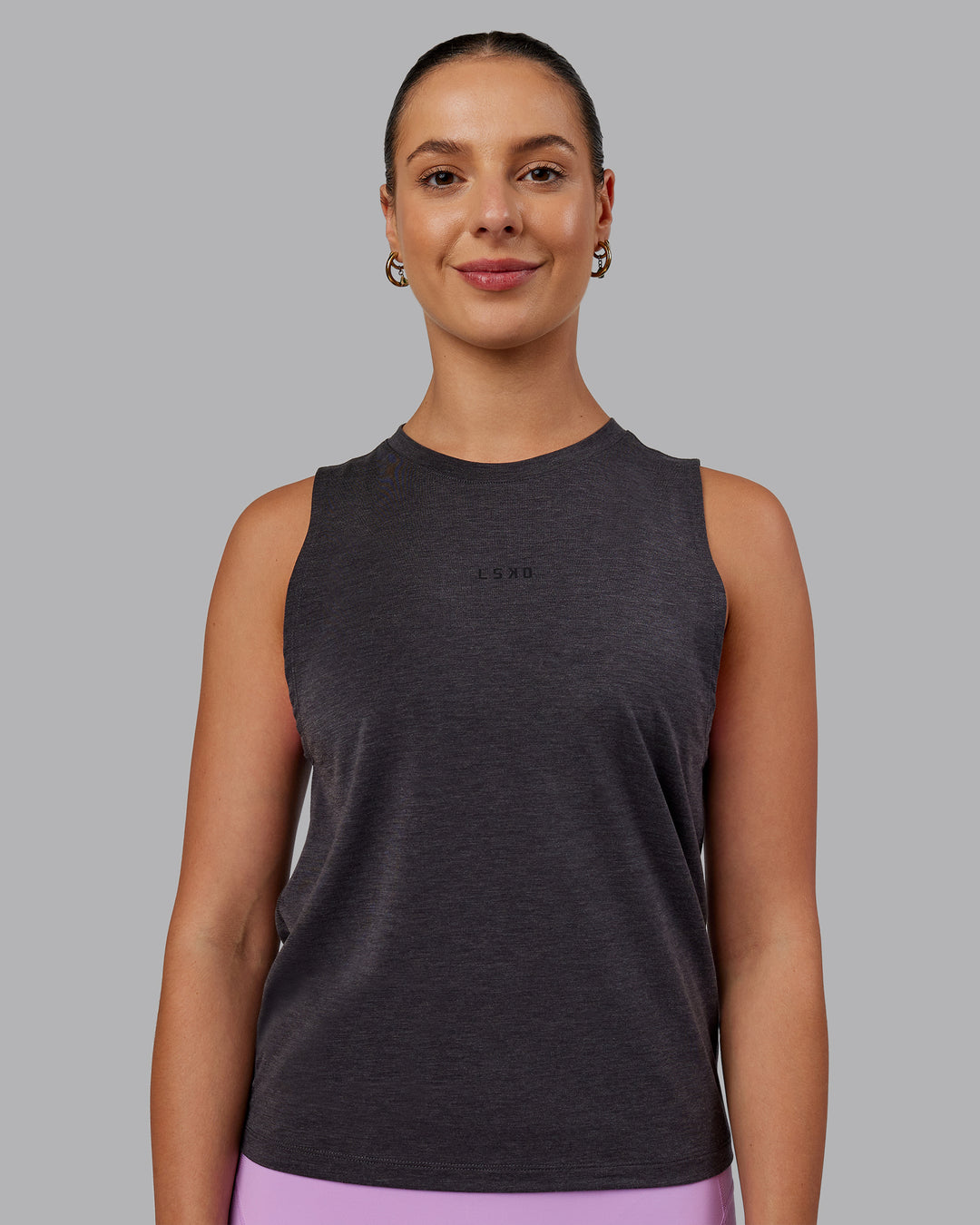 Woman wearing Unleash Training Tank - Charcoal Marl