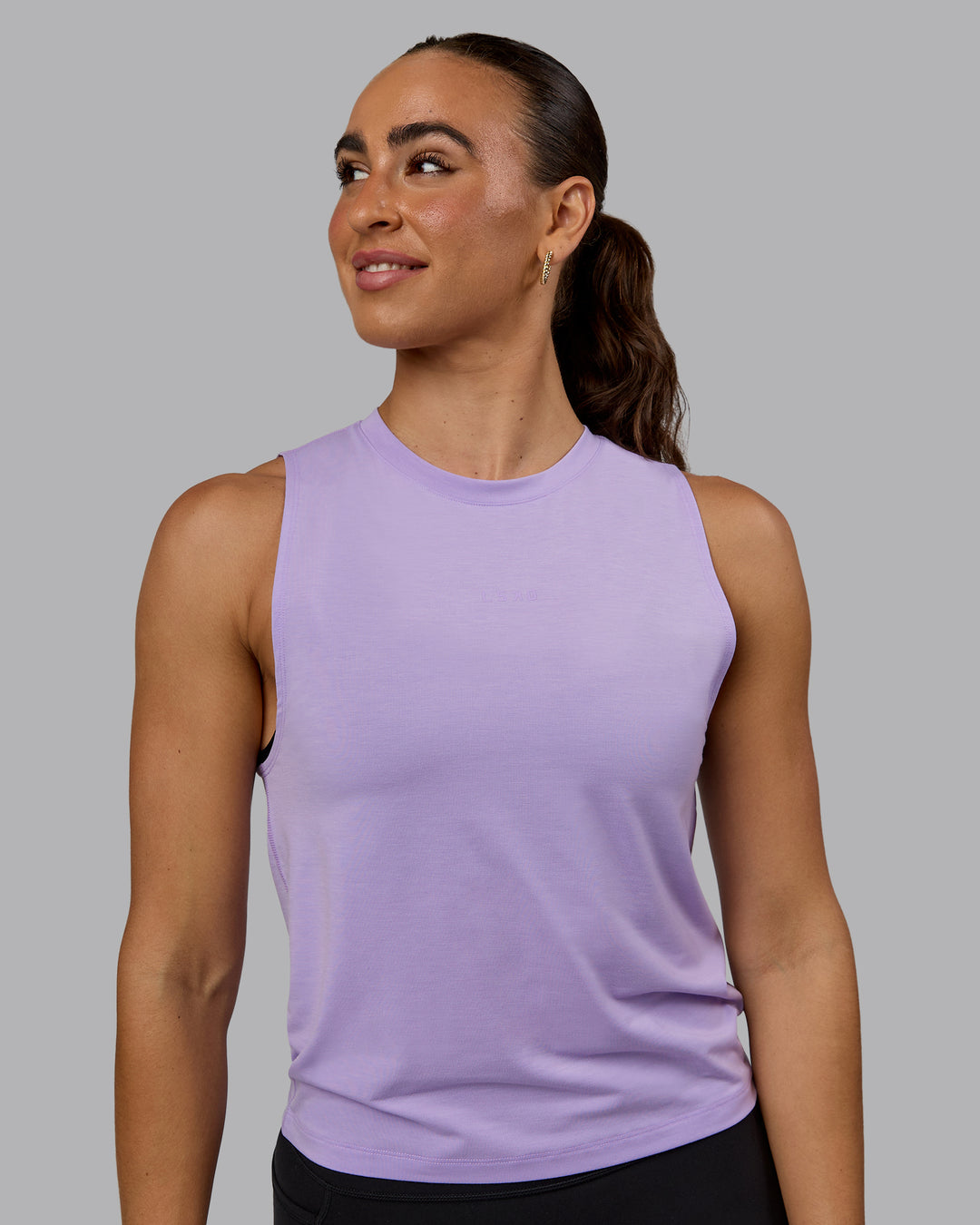 Woman wearing Unleash Training Tank - Pale Lilac