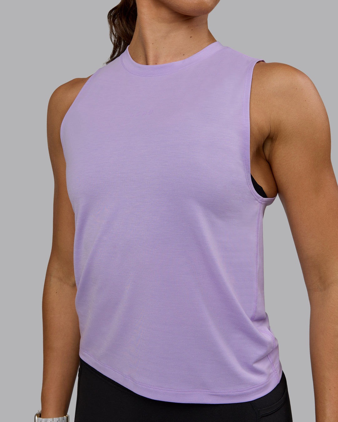 Woman wearing Unleash Training Tank - Pale Lilac