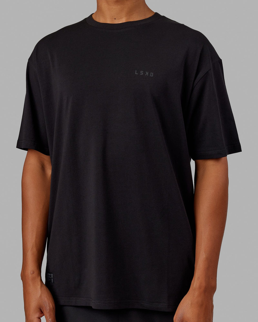 Man wearing Unisex VS5 FLXCotton Tee Oversize - Black-Black