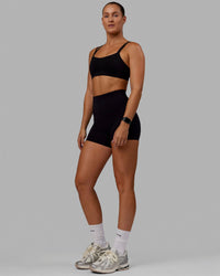 Woman wearing Vantage Sports Bra - Black
