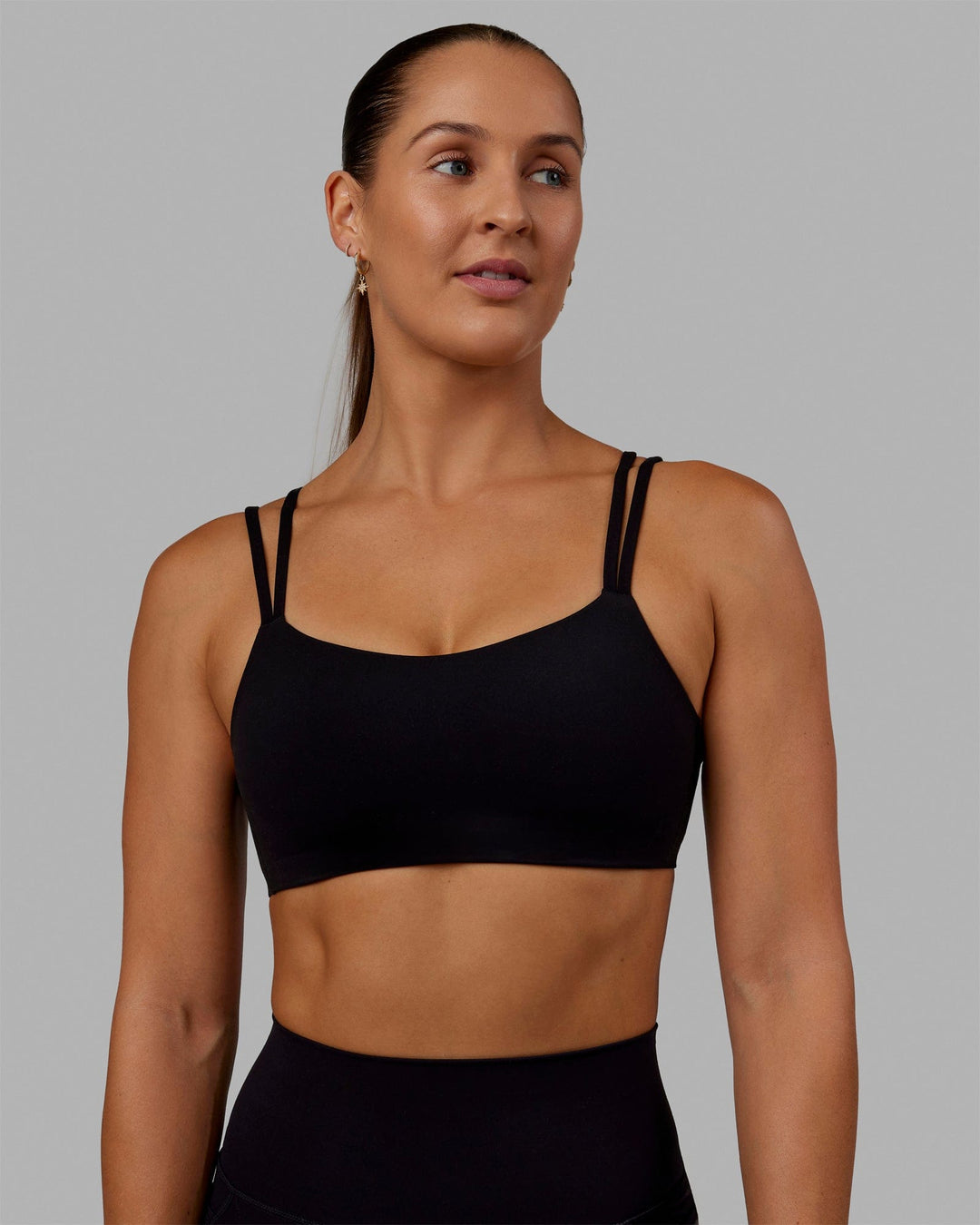 Woman wearing Vantage Sports Bra - Black