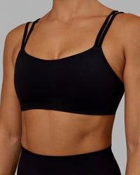 Woman wearing Vantage Sports Bra - Black