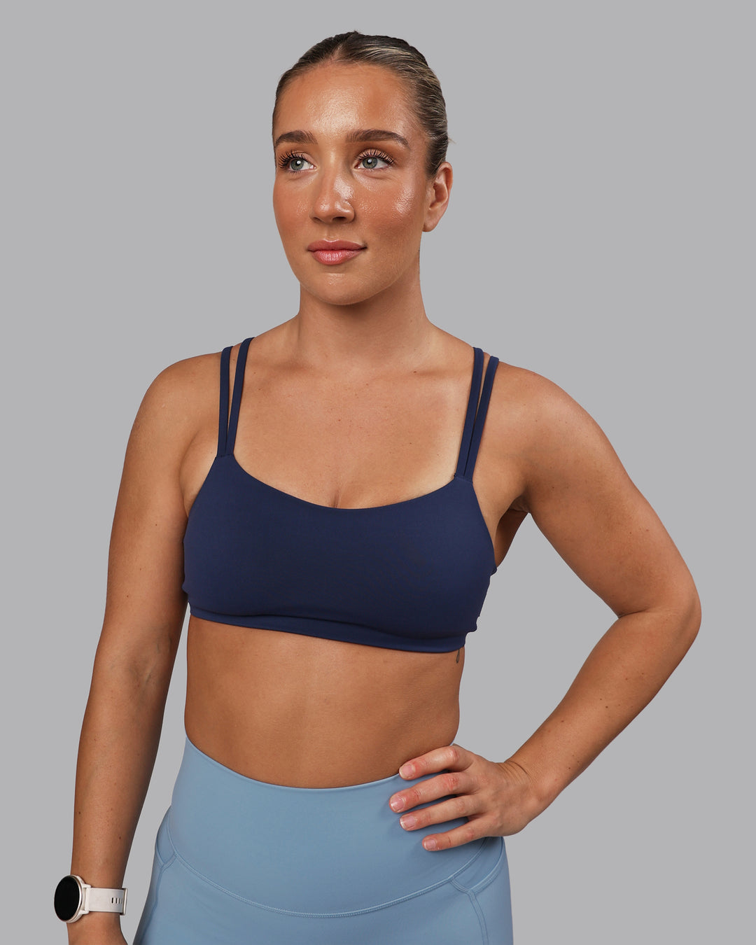 Woman wearing Vantage Sports Bra - Future Navy