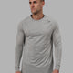 Man wearing Perform VapourFLX LS Tee - Lt Grey Marl