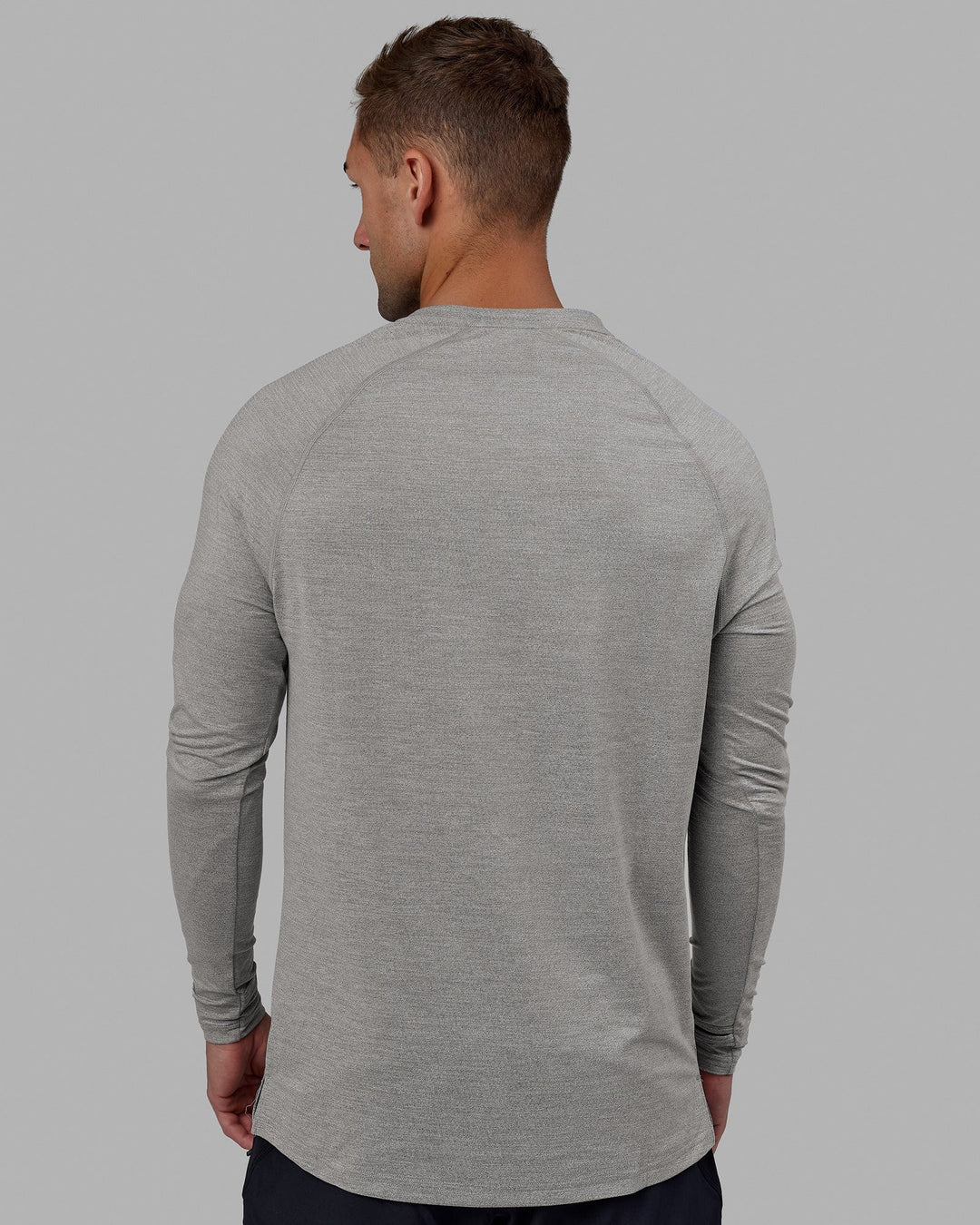 Man wearing Perform VapourFLX LS Tee - Lt Grey Marl