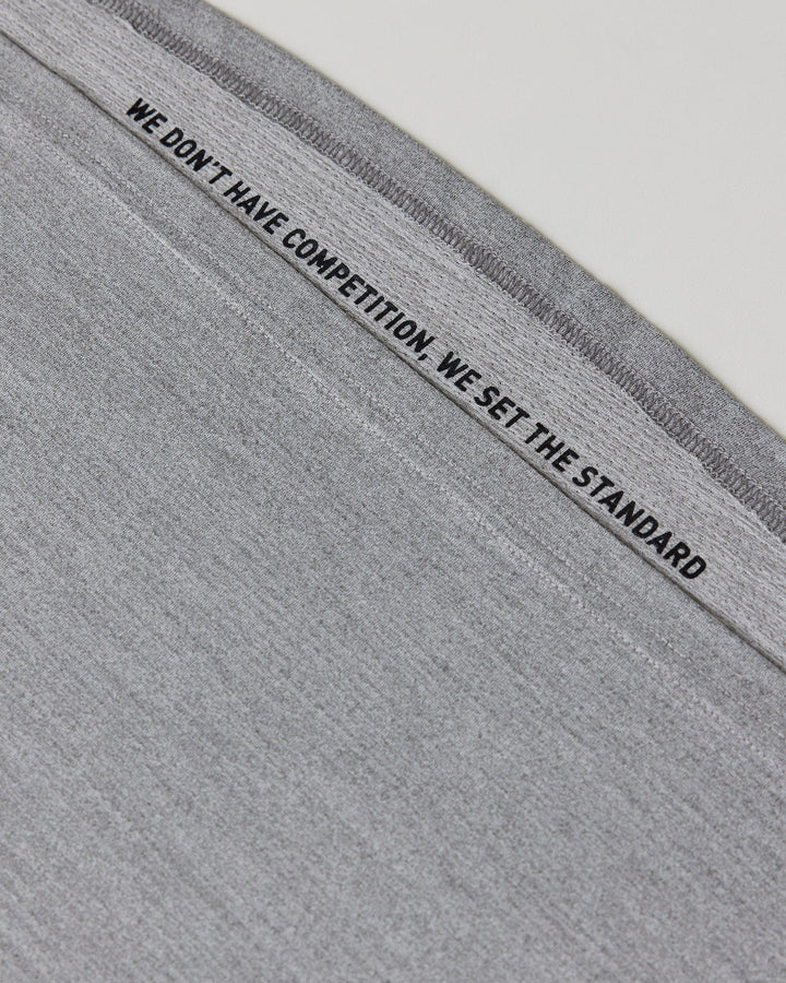 Man wearing Perform VapourFLX LS Tee - Lt Grey Marl