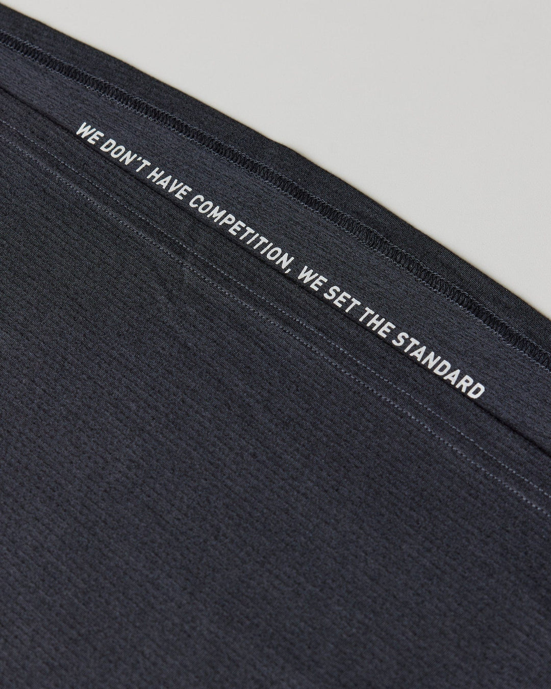 Woman wearing Perform VapourFLX Tank - Black Marl