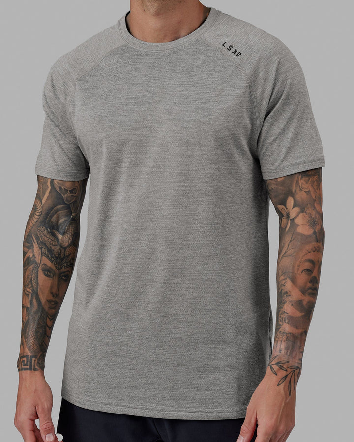 Man wearing Perform VapourFLX Tee - Lt Grey Marl