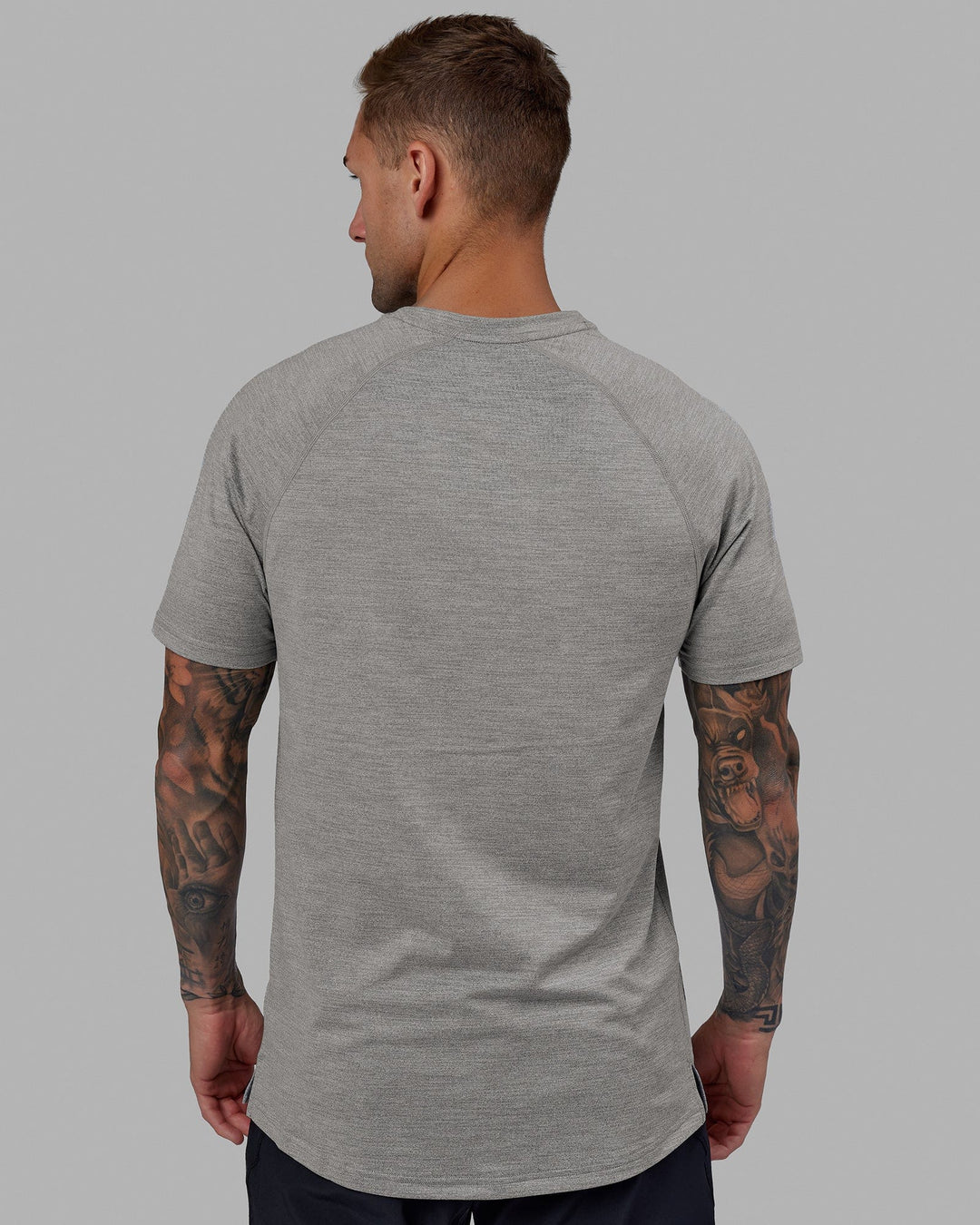 Man wearing Perform VapourFLX Tee - Lt Grey Marl