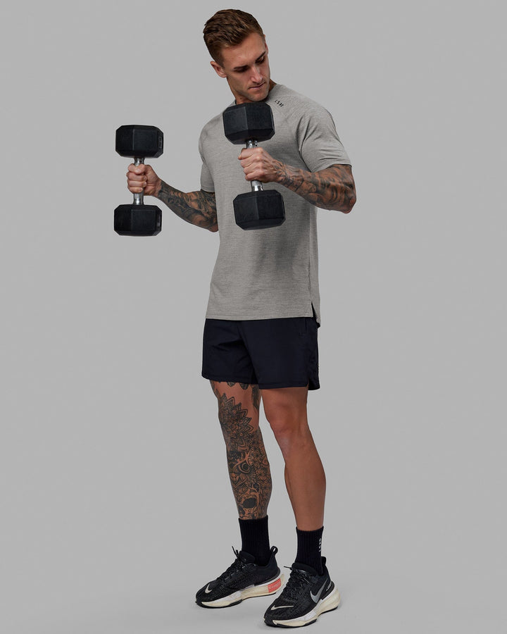 Man wearing Perform VapourFLX Tee - Lt Grey Marl