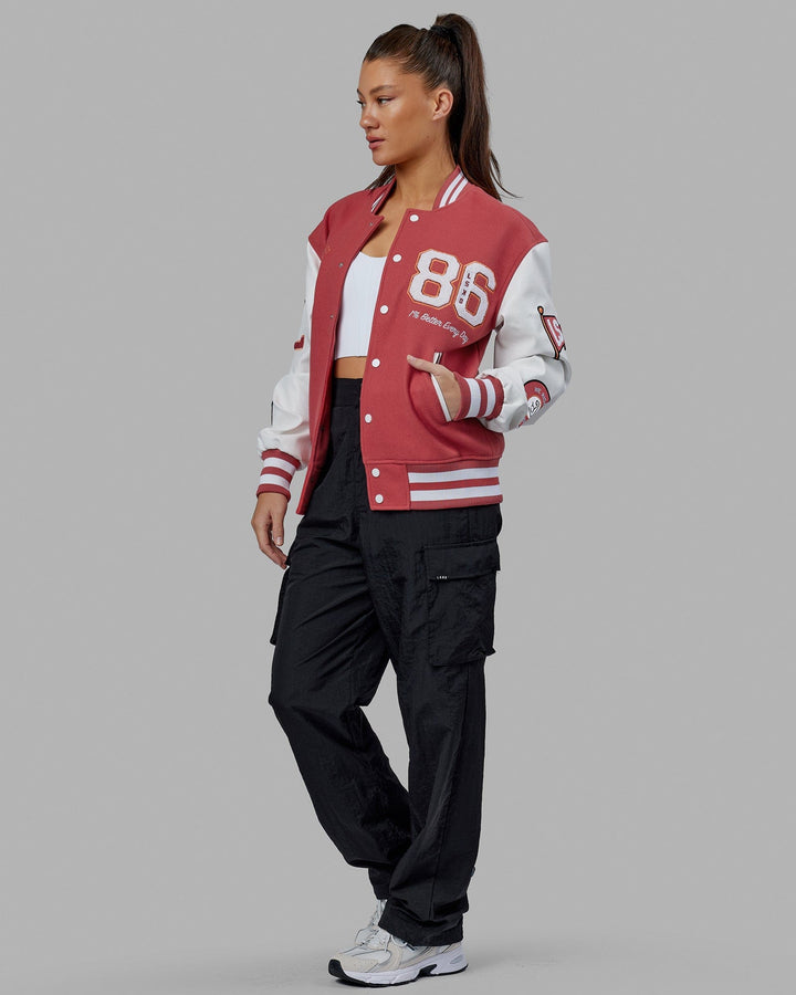 Woman wearing Unisex Varsity Bomber Jacket - Mineral Red