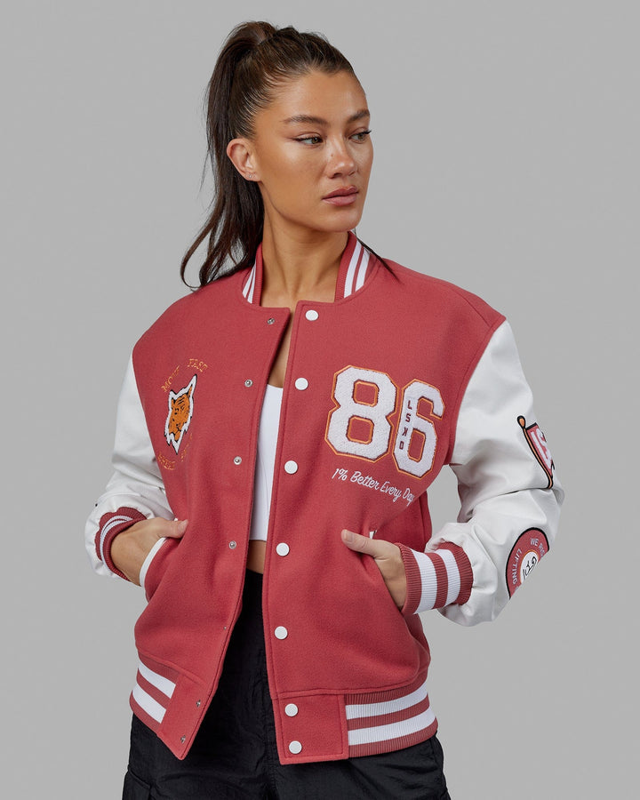 Woman wearing Unisex Varsity Bomber Jacket - Mineral Red