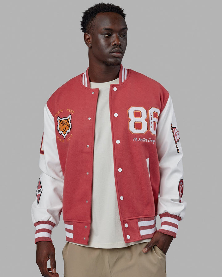 Man wearing Unisex Varsity Bomber Jacket - Mineral Red