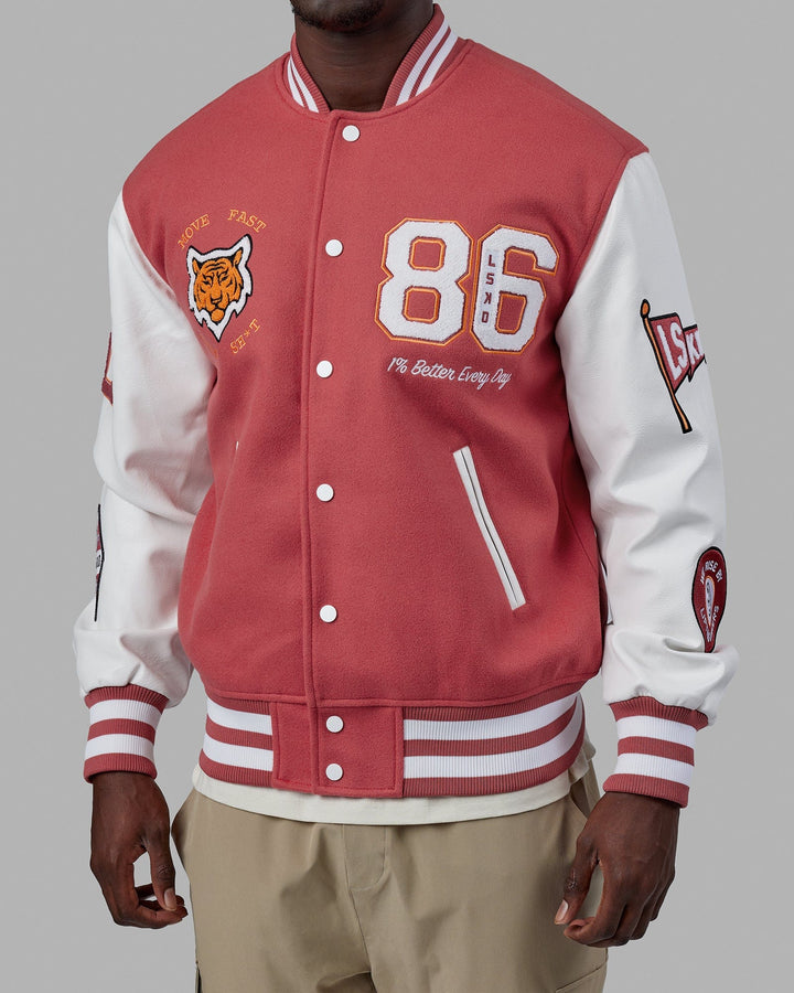 Man wearing Unisex Varsity Bomber Jacket - Mineral Red