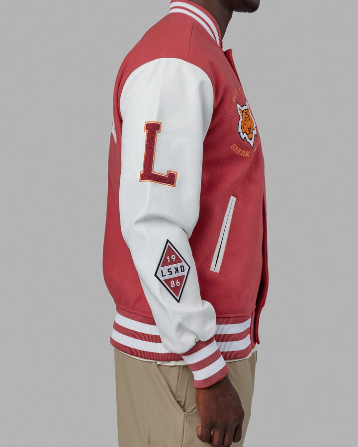 Man wearing Unisex Varsity Bomber Jacket - Mineral Red