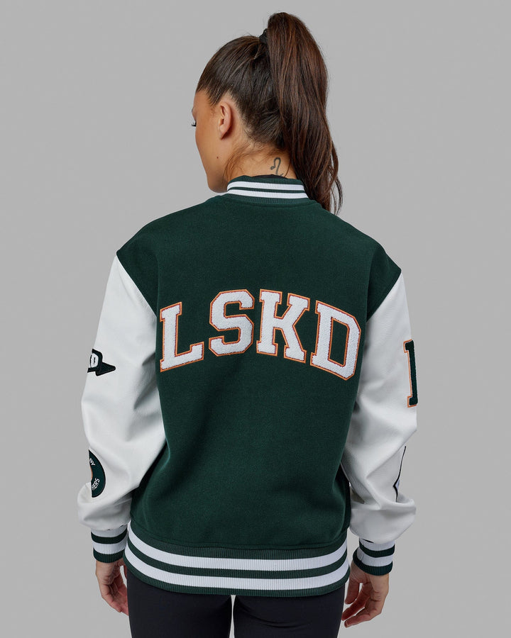 Woman wearing Unisex Varsity Bomber Jacket - Vital Green