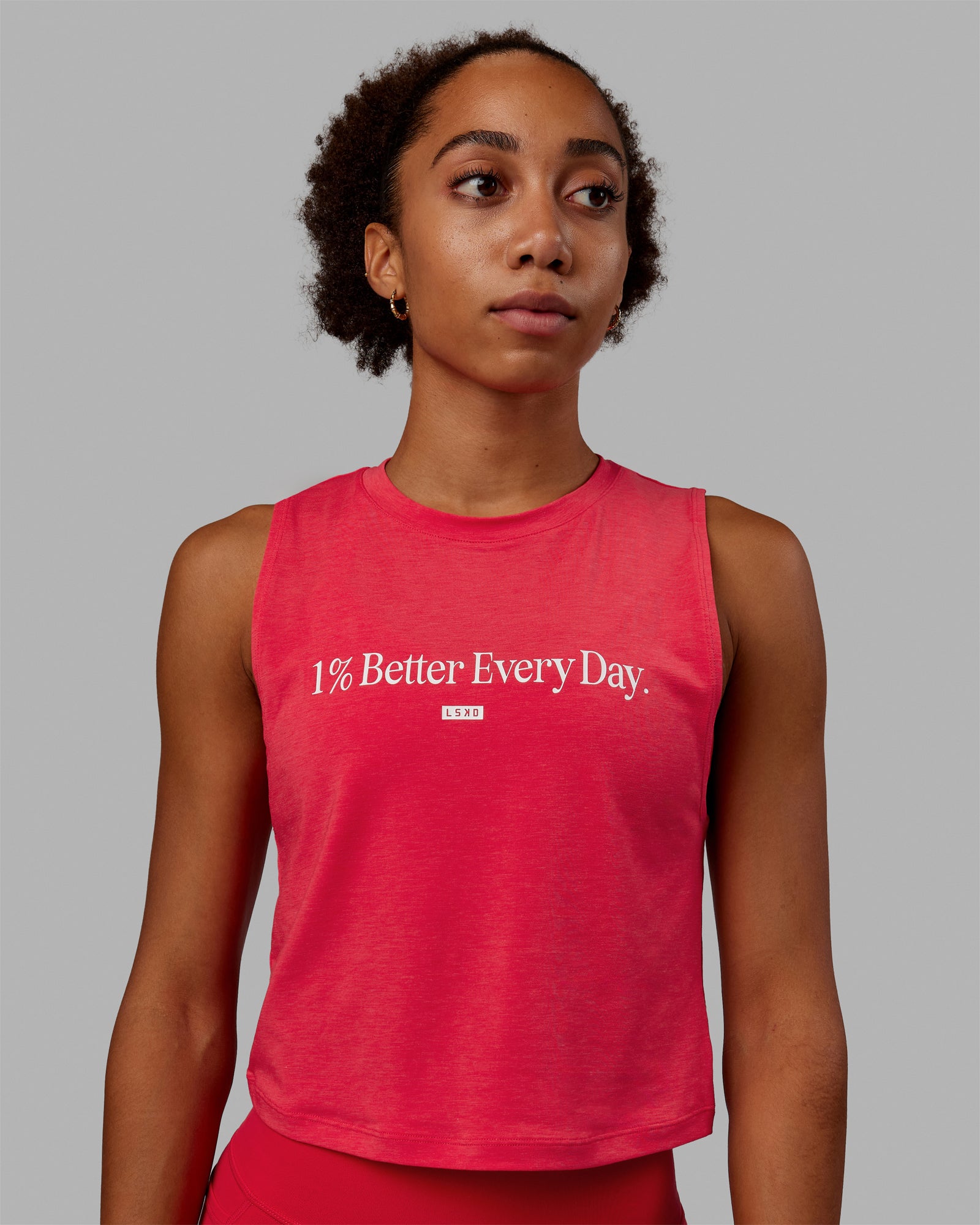 Woman wearing Vital 1% Better Cropped Training Tank - Scarlet Marl-White