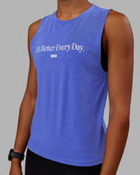 Woman wearing Vital 1% Better Training Tank - Power Cobalt-White