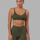 Woman wearing Vitalise Ribbed Bralette - Forest Night