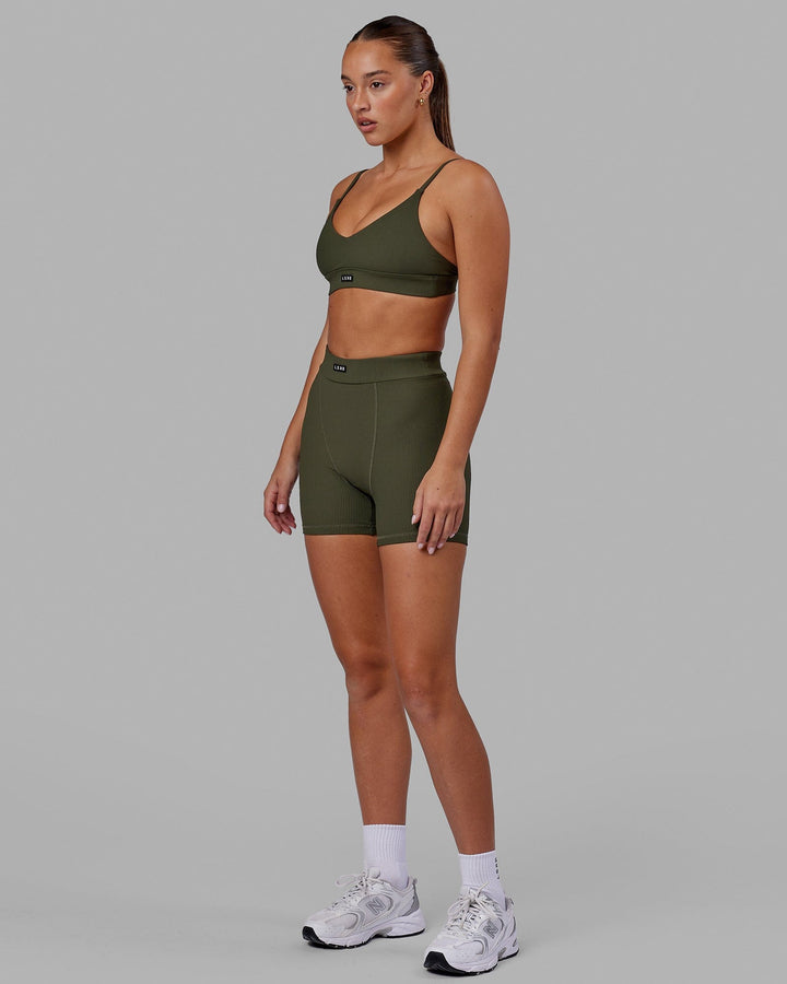 Woman wearing Vitalise Ribbed Mid Short - Forest Night