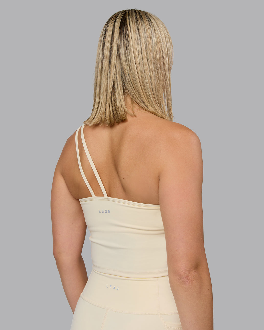 Woman wearing Vivid Skimmer Shelf Bra Tank - Ivory