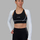 Woman wearing Warm Up LS Bolero - White