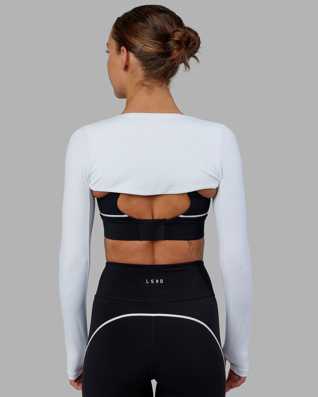 Woman wearing Warm Up LS Bolero - White