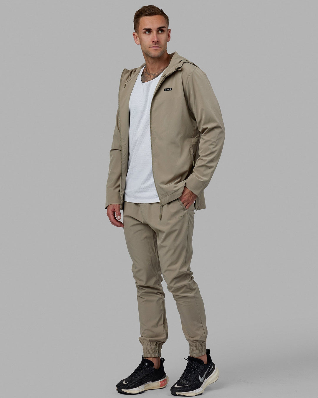 Man wearing Warm Up Zip Cuff Performance Jogger - Laurel Oak